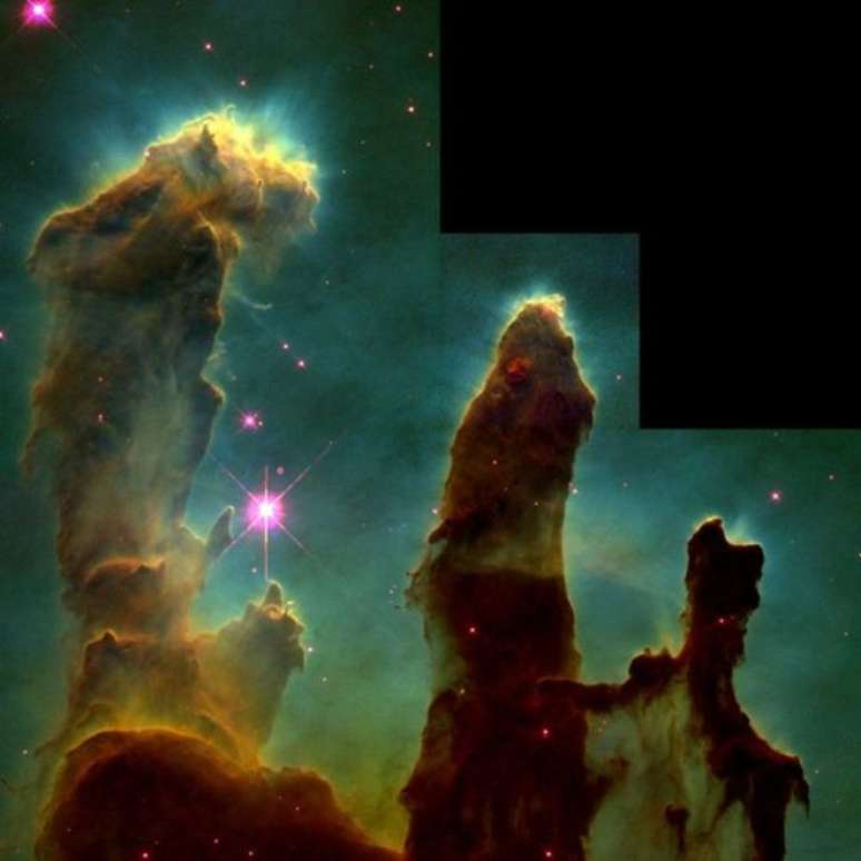 Imagem da nebulosa de Águia, obtida pelo telescópio espacial Hubble