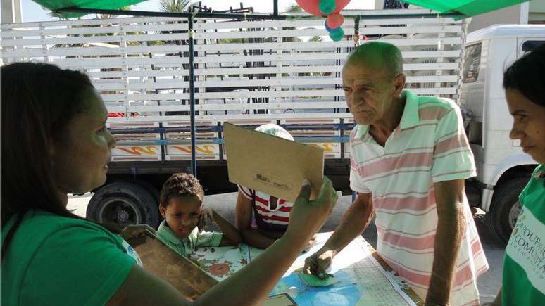 Poupança comunitária a Ilha de Deus ajuda a reorganizar finanças de moradores