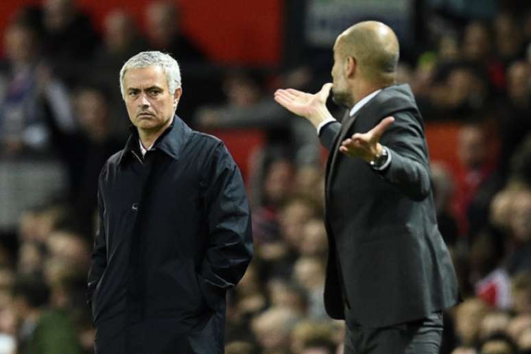 Equipes de Mourinho e Guardilam voltarão a se enfrentar no fim de abril (Foto: Oli Scarff / AFP)