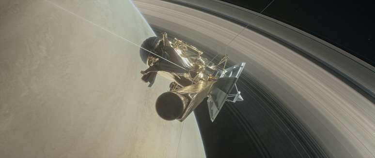 Ilustração da Nasa mostra a sonda Cassini na órbita de Saturno