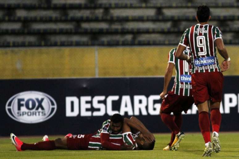 Emoção: Marlon Freitas desabou após marcar contra a Universidad Católica (Foto: Nelson Perez/Fluminense F.C.)