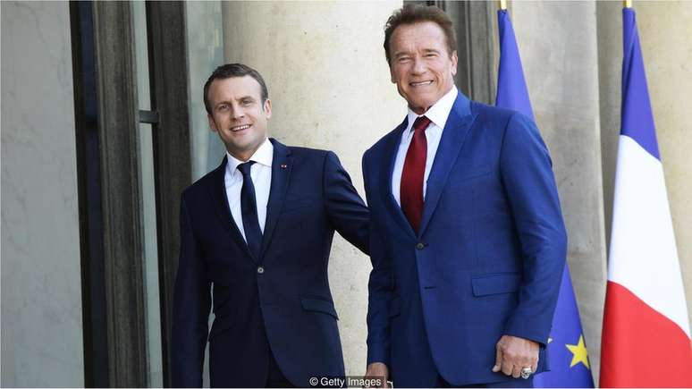 Emmanuel Macron e Arnold Schwarzenegger