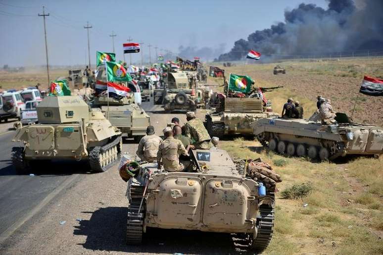 For&ccedil;as da Mobiliza&ccedil;&atilde;o Popular Xiita e do Ex&eacute;rcito iraquiano se re&uacute;nem nas redondezas de Hawija, no Iraque 04/10/2017 REUTERS/Stringer