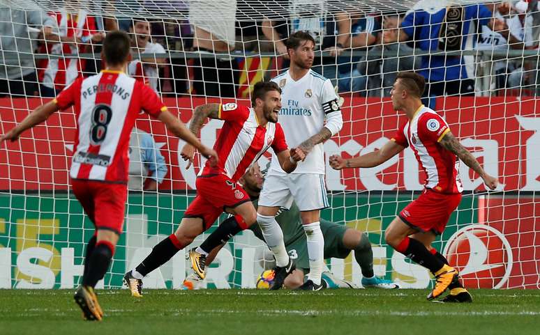 Atacante Portu, do Girona, comemora o gol que marcou na vitória sobre o Real Madrid, pelo Campeonato Espanhol.