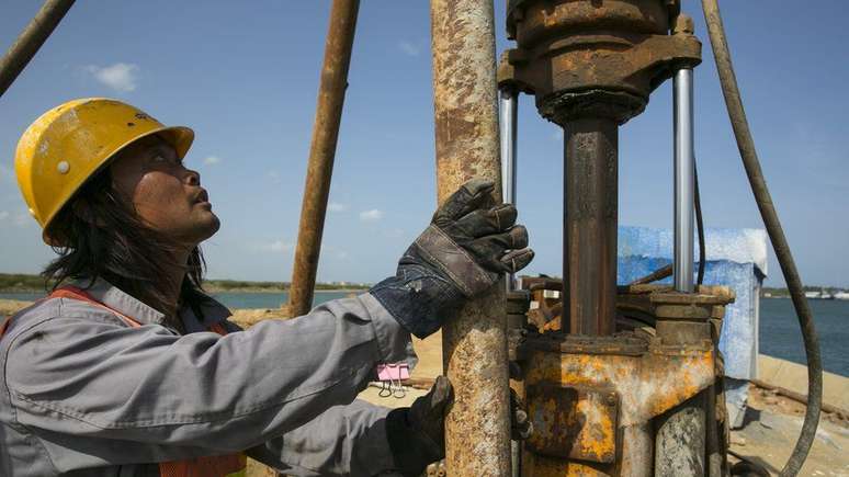 Trabalhador chin&ecirc;s | Foto: Paula Bronstein