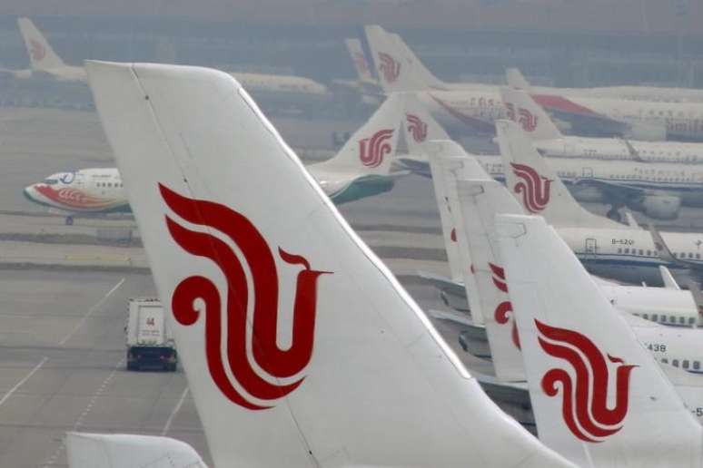 Aviões da Air China são vistos estacionados em aeroporto internacional de Pequim, China 
28/03/2016 REUTERS/Kim Kyung-Hoon/File Photo