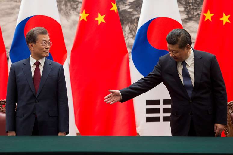 Presidente chinês Xi Jinping (D) se reúne com sul-coreano Moon em Pequim
 14/12/2017    REUTERS/Nicolas Asfouri/Divulgação