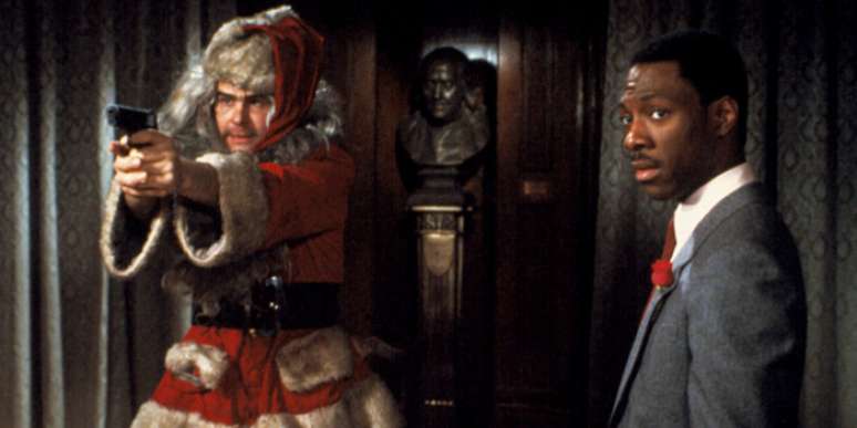 Dan Aykroyd, de Papai Noel, e Eddie Murphy em Trocando as Bolas