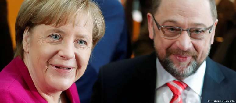 Angela Merkel (CDU) e Martin Schulz (SPD): alegres "rivais aliados" em Berlim