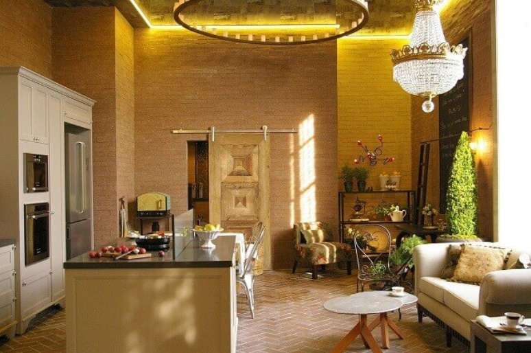 11. A parede de tijolinhos d&aacute; um ar de aconchego ao projeto da Adriana Giacometti