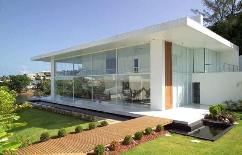 7. Projetos de casas modernas com parede de vidro ficam lindíssimos. Projeto de SQ+ Arquitetos Associados