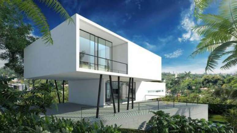 40. Esta imagem mostra bem como são as fachadas de casas modernas: muitas linhas retas, branco, formas geométricas e vidro