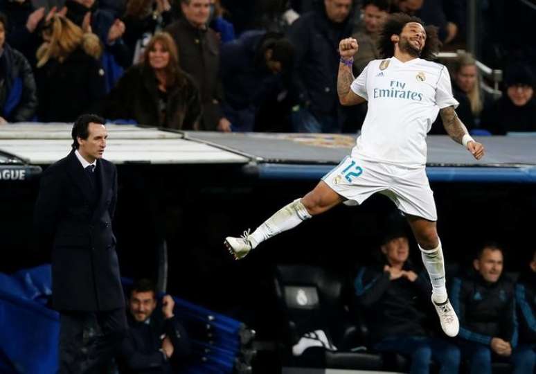 O brasileiro Marcelo comemora seu gol na vitória do Real Madrid contra o PSG
14/02/2018
REUTERS/Stringer