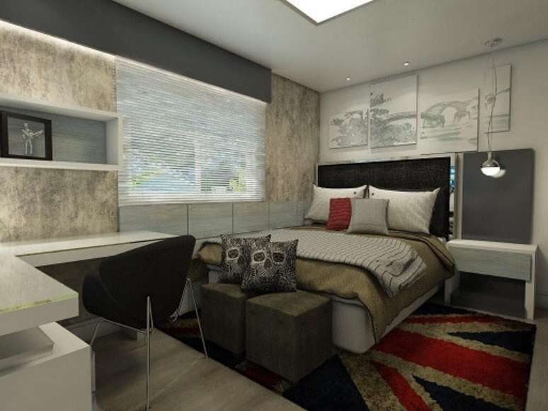 59. No projeto de Ednilson Hin, temos almofadas decorativas em cima da cama e nos puffs