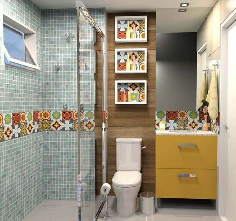17. Decoração de banheiro simples com muitas cores.