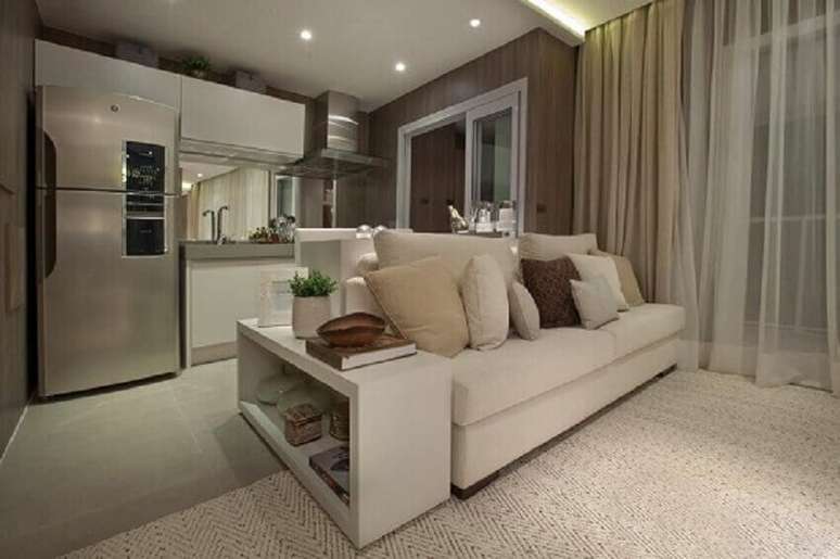 19. A integra&ccedil;&atilde;o de ambientes &eacute; tamb&eacute;m uma caracter&iacute;stica comum da decora&ccedil;&atilde;o de apartamento pequeno. Projeto de Carlos Rossi