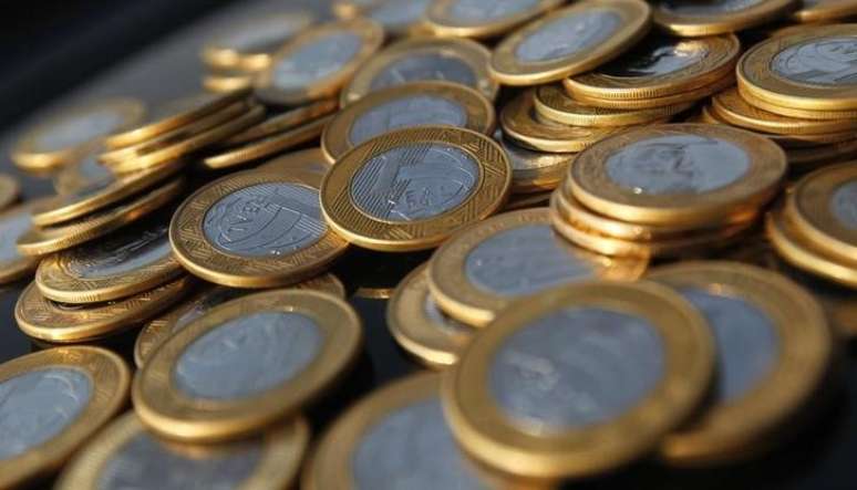 Moedas de um real em ilustra&ccedil;&atilde;o
15/10/2010 REUTERS/Bruno Domingos