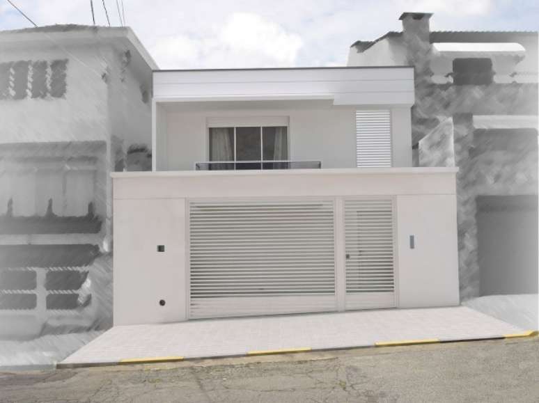 4. Aqui, temos um exemplo de frente de casas simples de dois andares e com muro. Projeto de Gilson de Carvalho