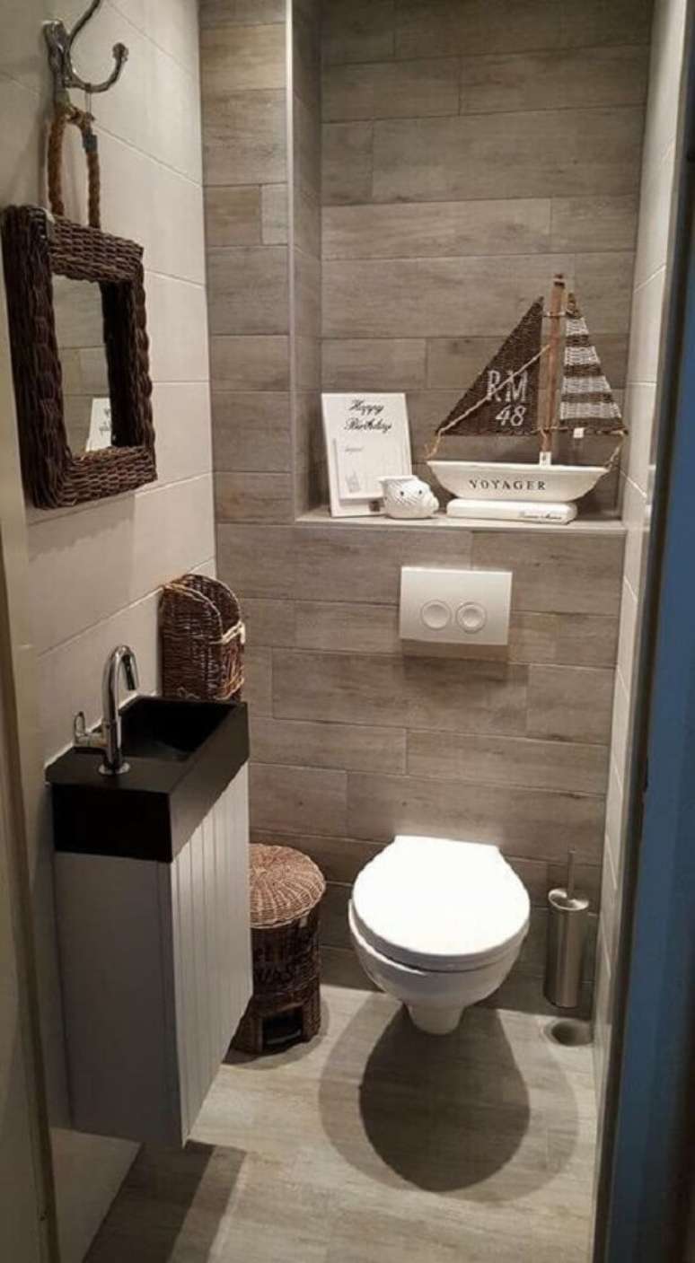 8. Invista em itens de decoração para deixar o lavabo pequeno simples ainda mais bonito e aconchegante.