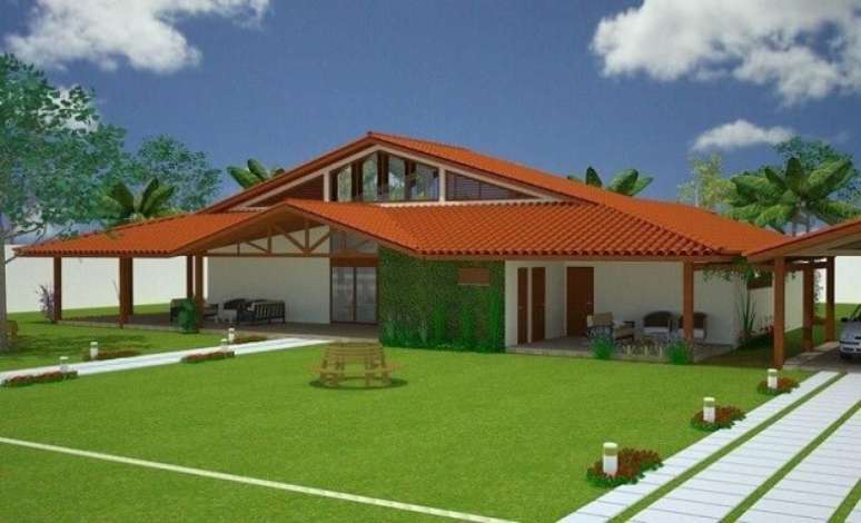 8. Casa com varanda e jardim frontal amplo. Projeto de Luiz Moreira
