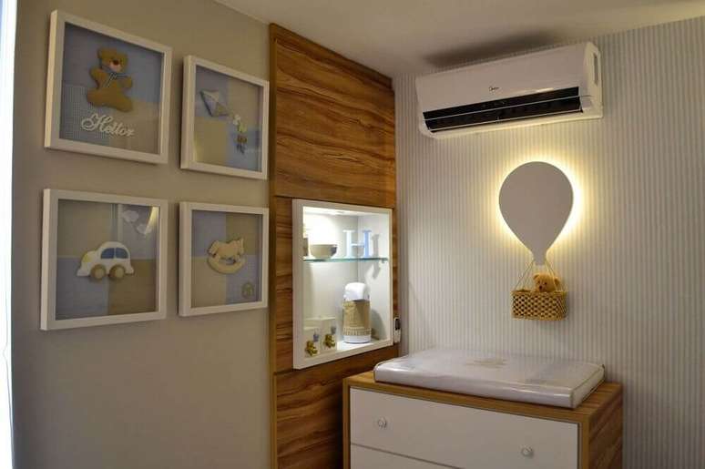 15. Luminária para quarto de bebê em formato de balão para iluminar o trocador.