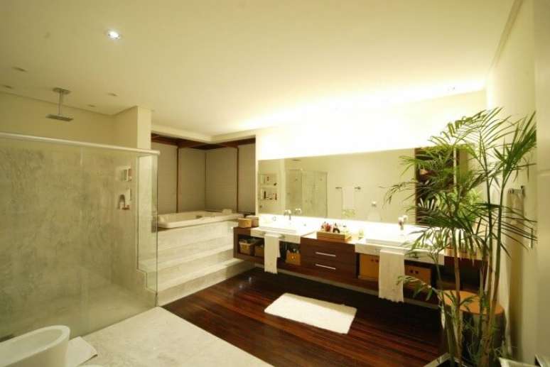 68. Revestimento amadeirado para o ch&atilde;o. Projeto de Mascarenhas Arquitetos