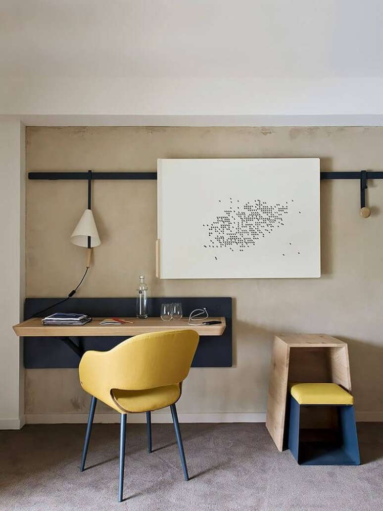 14. Modelo de escrivaninha suspensa minimalista ótima para decoração contemporânea