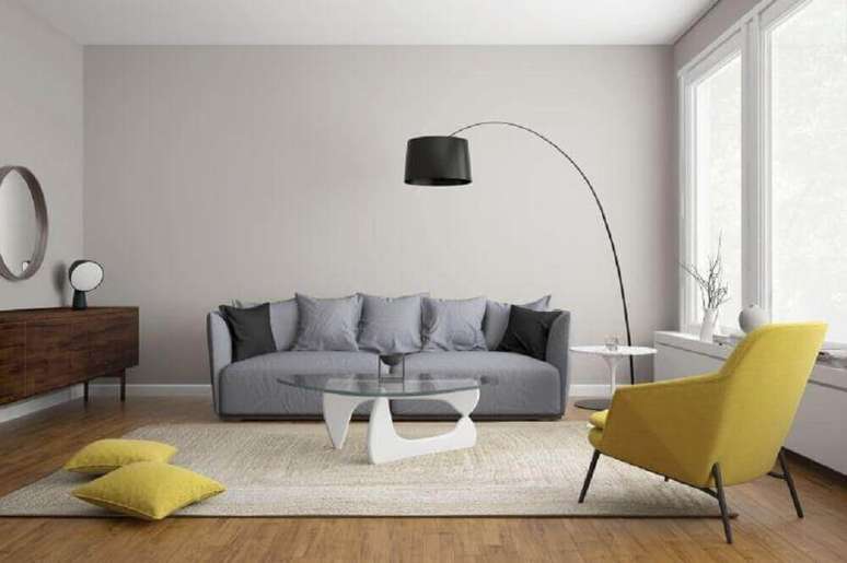 22. A decoração de sala cinza e amarelo sempre fica muito charmosa