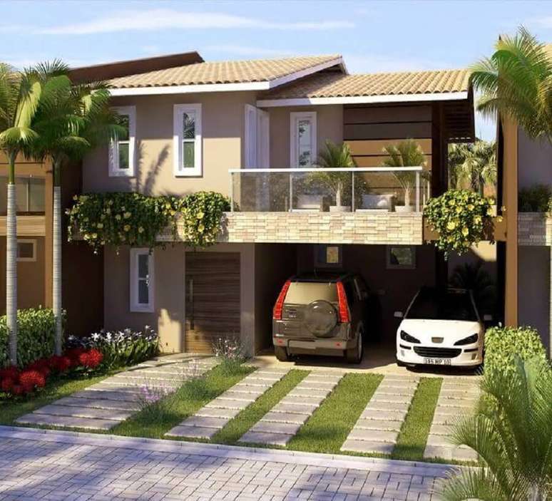 26. Lindo modelo de frente de casa com jardim e garagem