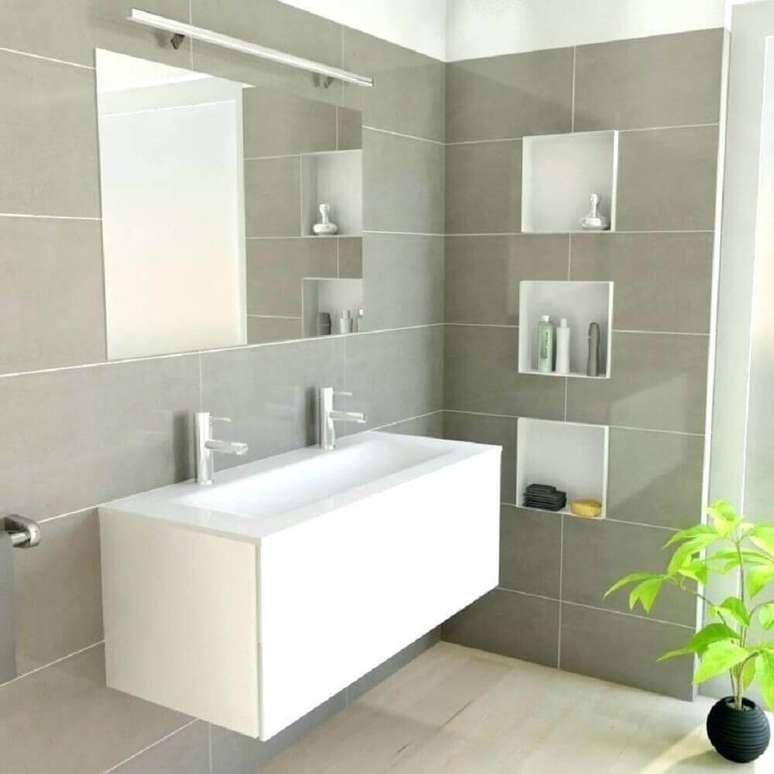 2. Decoração clean de banheiro com nicho embutido