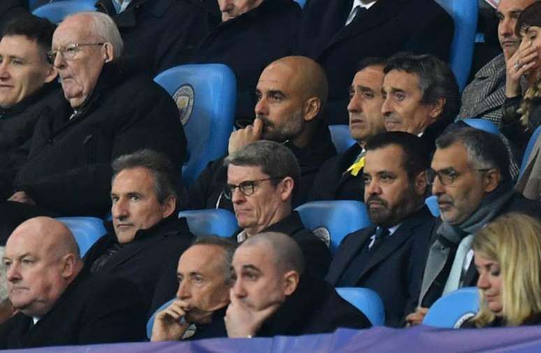 Guardiola ficou na arquibancada após ser expulso contra o Liverpool (Foto: Anthony Devlin / AFP)