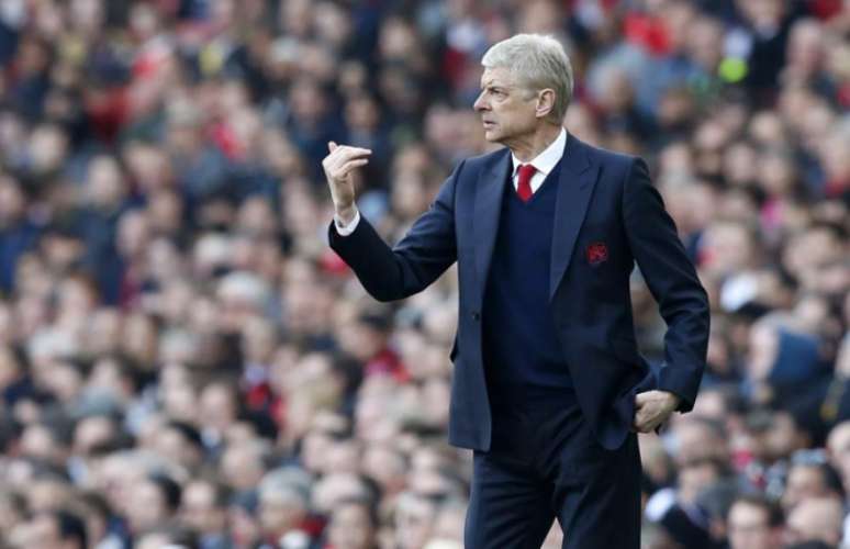Wenger fez história à frente do Arsenal (Foto: Ian Kington / AFP)