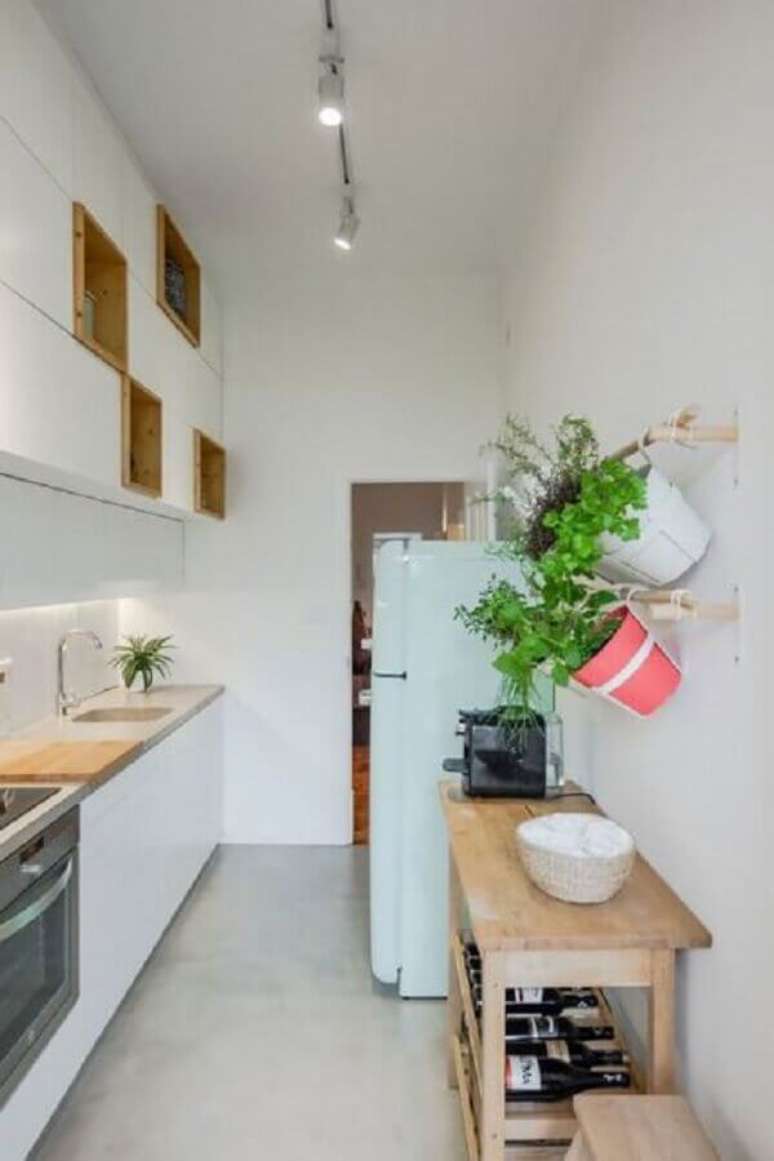 31. Cozinha pequena com horta para apartamento
