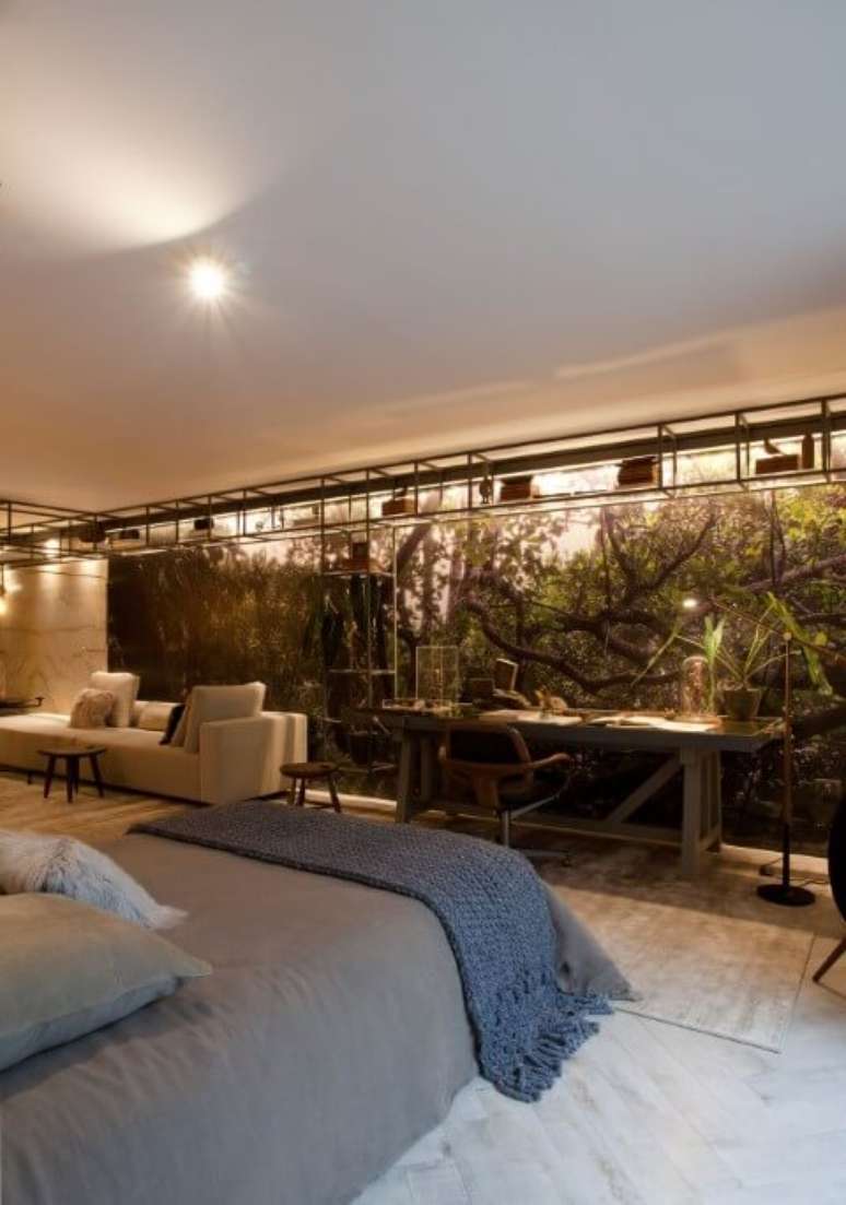 13. No projeto de Sandra Moura, o adesivo trouxe a natureza para dentro do quarto