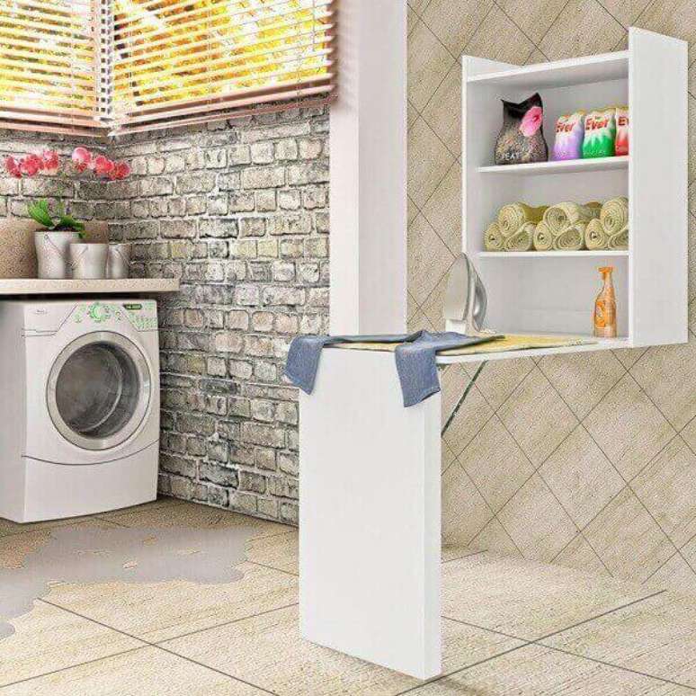 7- Arm&aacute;rio para &aacute;rea de servi&ccedil;o que pode ser utilizado como t&aacute;bua de passar roupa.