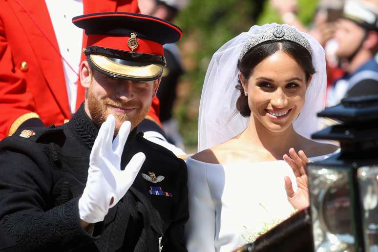 Príncipe Harry e Meghan Markle acenam após casamento 
 19/5/2018     Chris Jackson/Divulgação via REUTERS 