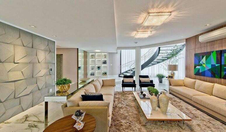 49. Revestimento 3D com visual de pedra na sala de estar. Projeto de Espa&ccedil;o do Tra&ccedil;o