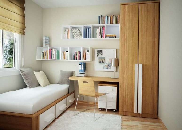 40. Utilize nichos e prateleiras para manter o seu home office pequeno no quarto mais organizado