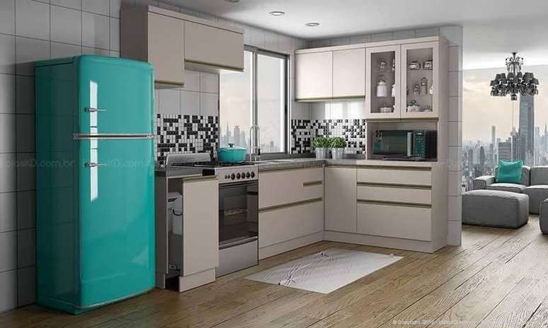 28. Cozinha bege com geladeira verde. Projeto de Lojas KD