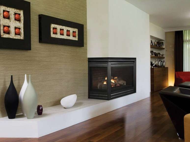 14. A lareira de canto pode ser feita tanto a g&aacute;s, a lenha, el&eacute;trica ou ecol&oacute;gica