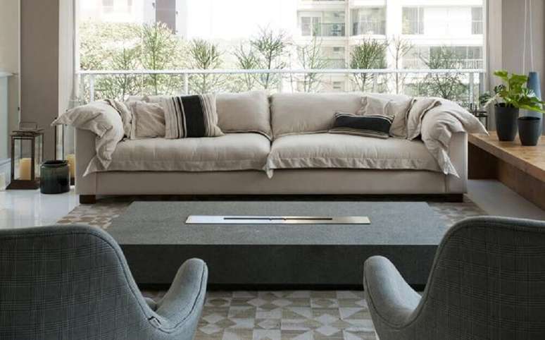 53. Alguns modelos de lareiras podem at&eacute; vir embutida em sua mesinha de centro