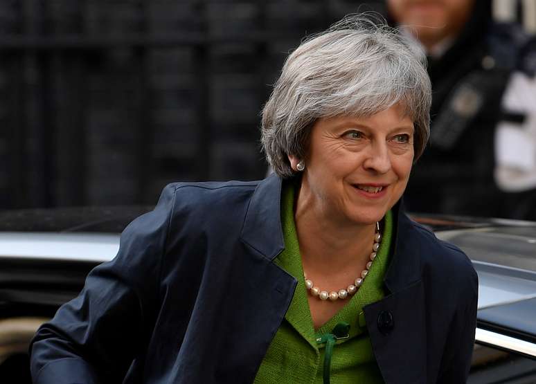 May volta ao seu gabinete após votação no Parlamento
 12/6/2018    REUTERS/Toby Melville 