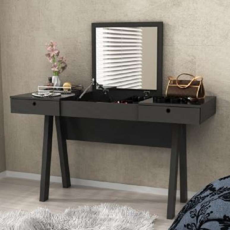 29 &ndash; As penteadeiras modernas servem como escrivaninha e tem espelho apoiado.