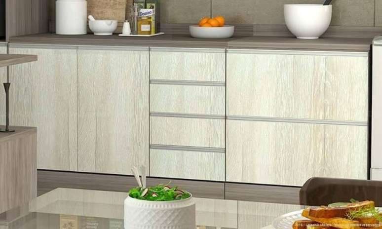 29. Cozinha modulada com arm&aacute;rio bege com marrom. Projeto de Lojas KD