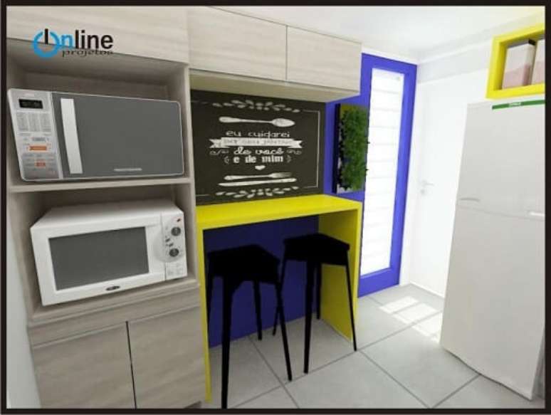 5. Cozinha modulada com armário discreto e detalhes amarelos. Projeto de Online Projetos