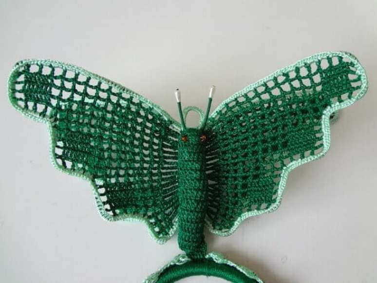 16 – Porta pano de prato de crochê de borboleta verde.