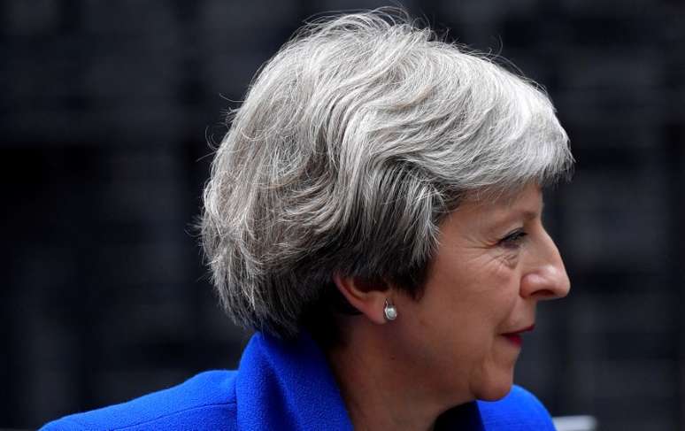 Primeira-ministra britânica, Theresa May, chega em Downing Street depois de obter uma vitória em votação sobre o Brexit no Parlamento
20/06/2018
REUTERS/Toby Melville