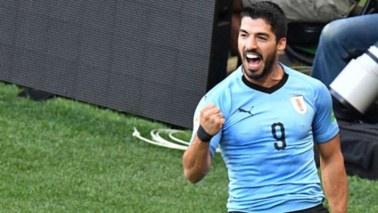 Suárez segue fazendo história com o Uruguai (Foto: AFP)