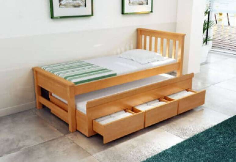 24 – Móvel com cama auxiliar e três gavetas.