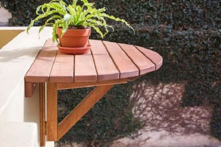 9- Mesa dobrável de parede no jardim para espaço gourmet